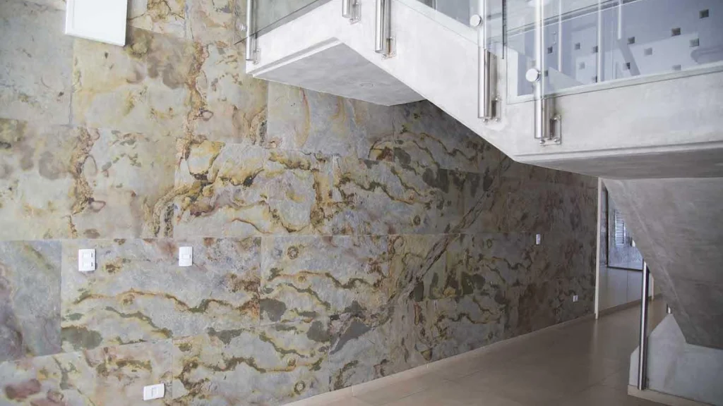 Flexible stone veneer cladding on an outdoor staircase feature wall in Dubai